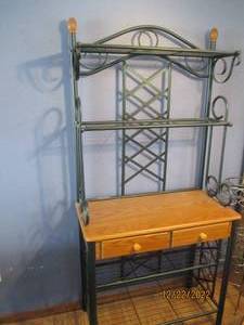 Bakers rack with string metal frame...
