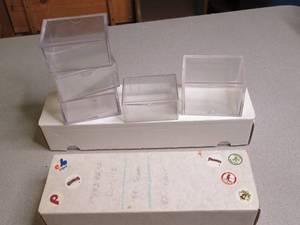 (2) boxes of assorted sports Cards and Empty clamshell storage Cases