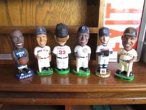 6 painted bobbles heads featuring B...