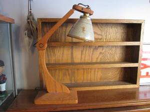 lamp and wooden display on top of t...