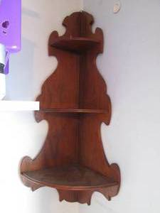 Cute wooden corner shelf...