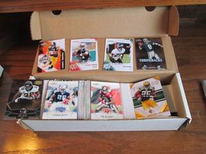 34 full sleeve of football trading...