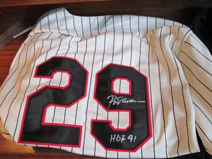 Autographed #29 Twins jersey and an...
