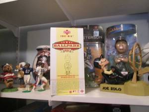Sport merchandise, bobble heads and...