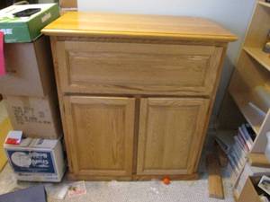 Large wooden cabinet with measureme...