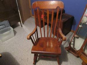 Wooden high back rocking chair...