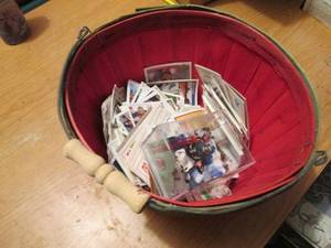 Basket of sports cards offered as i...