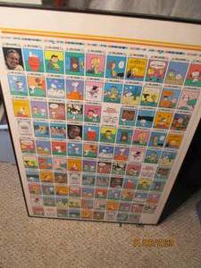 Framed Peanuts theme poster...