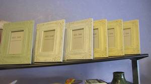 lot of picture frames of different ...