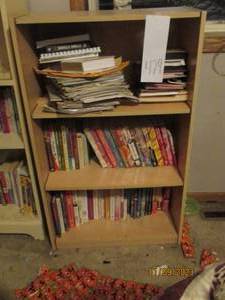 4-tier wood shelf and content. meas...