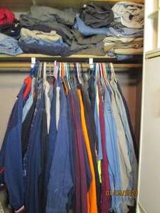 All assorted size mens clothing in...