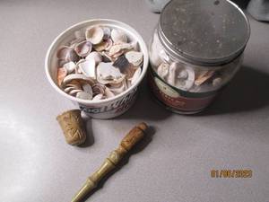 Shell collection with ornate grindi...