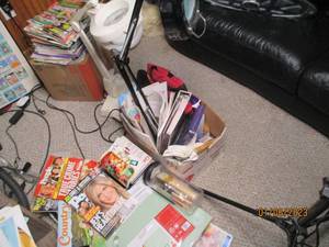 Lot of magnifying lamps and magazin...