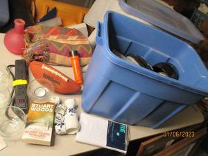 Covered tote filled with assorted m...