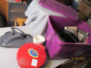 Covered tote filled with assorted h...