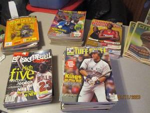 Box of Sports Magazines such as foo...