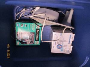 Covered tote full of assorted headp...