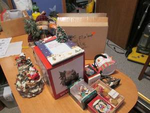 Box of Christmas decor and music bo...