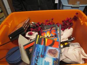 Covered tote full of assorted dvds ...