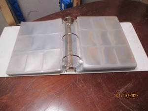 Huge 3-ring binders full of empty c...