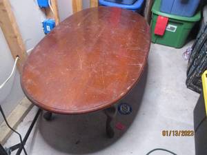 Dark wood Oval coffee table with si...