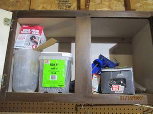 Garage cupboard full of hardware ga...