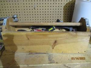 Wood toolbox loaded with screwdrive...