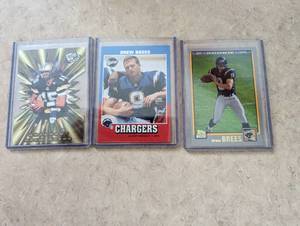 3 Drew Brees Rookie Cards...
