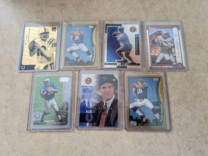 7 Peyton Manning cards including Ro...
