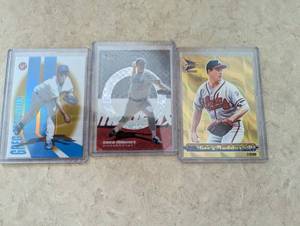 3 Greg Maddux cards including Xfrac...