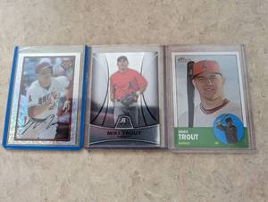 3 Mike Trout cards...