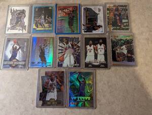 12 Vince Carter cards including Roo...