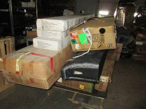 pallet of items that need work or a...