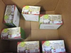 box of regular mouth canning lids a...