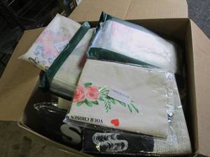 box of new decorative pillow covers...