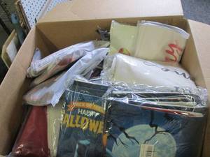 box of new decorative pillow covers...