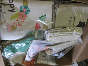 box of new decorative pillow covers...