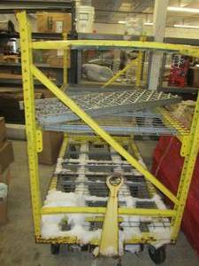 big yellow cart on wheels with hitc...