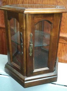 Glass and Wood display end table.