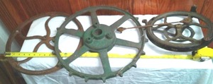 (2) Cast Treadle Wheels And Another Beast