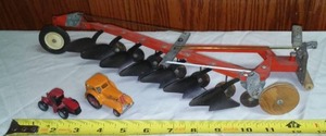 Metal Seven Bottom Plow And Small M And M, IH.