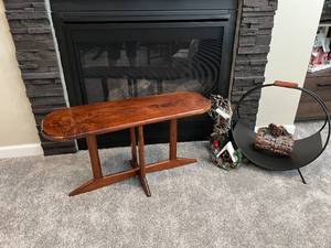 lot 35 image: Wood Oval Table with Crossed Wooden Legs