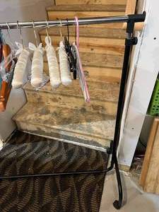 lot 77 image: Portable Clothes Rack and Hangers