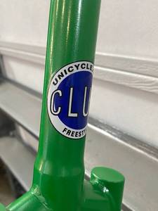lot 98 image: Green Unicycle with 20 Wheels