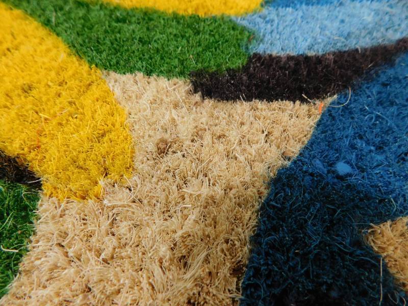 lot 164 image: New - PVC backed floral coir door mat 18 in. W x 30 in. L