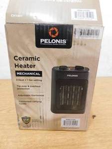 lot 27 image: Pelonis 1500-Watt 9 in. Electric Personal Ceramic Space Heater with Thermostat