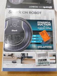 lot 32 image: Shark ION Robot Vacuum Cleaner, Multi-Surface Cleaning, Works with Alexa, and Wi-Fi Connected