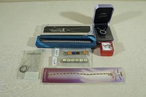 lot 127 image: Assorted Costume Jewelry -Necklaces, Ring, Bracelets
