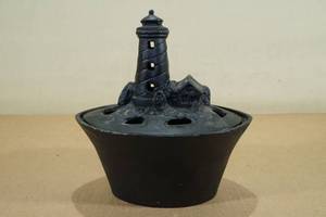 lot 139 image: Vintage Cast Iron Lighthouse Humidifier