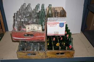 lot 201 image: $10 Bill with 3 Vintage Shipping Crates and Vintage Bottles